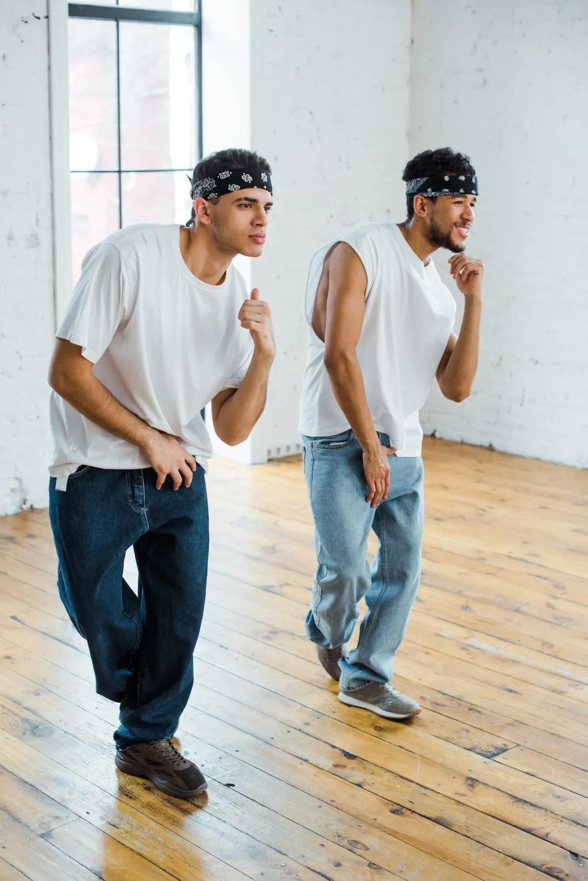 handsome-multicultural-dancers-in-headbands-dancing-hip-hop-e1684994207802